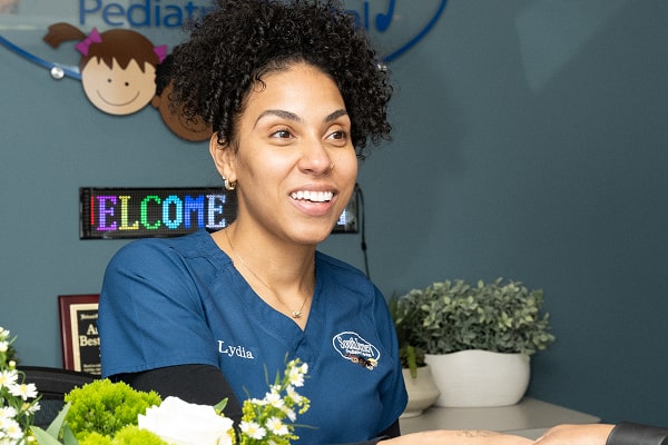 A boy is happily smiling in a dental chair with South Jersey dentist