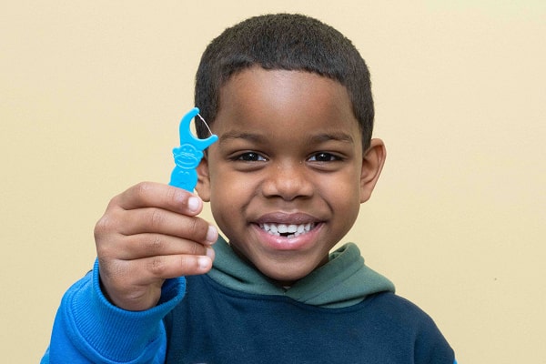 A boy is smiling at South Jersey