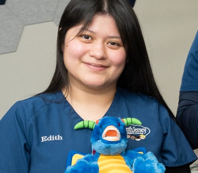 Dental specialist is smiling at South Jersey pediatrics