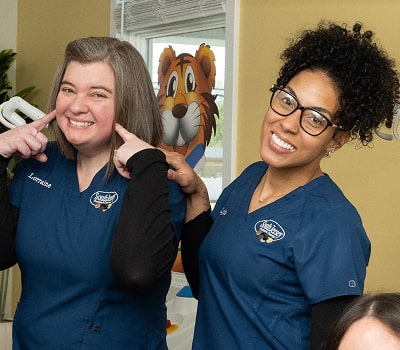 Dental specialists are smiling and having a good time